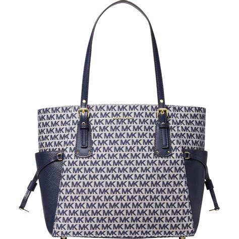 michael kors signature voyager east west signature tote|Michael Kors voyager signature tote.